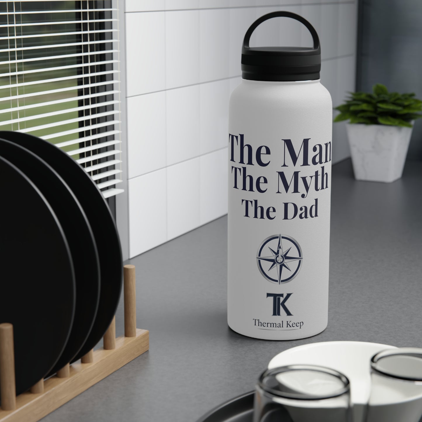 White water bottle with text and logo on a kitchen counter