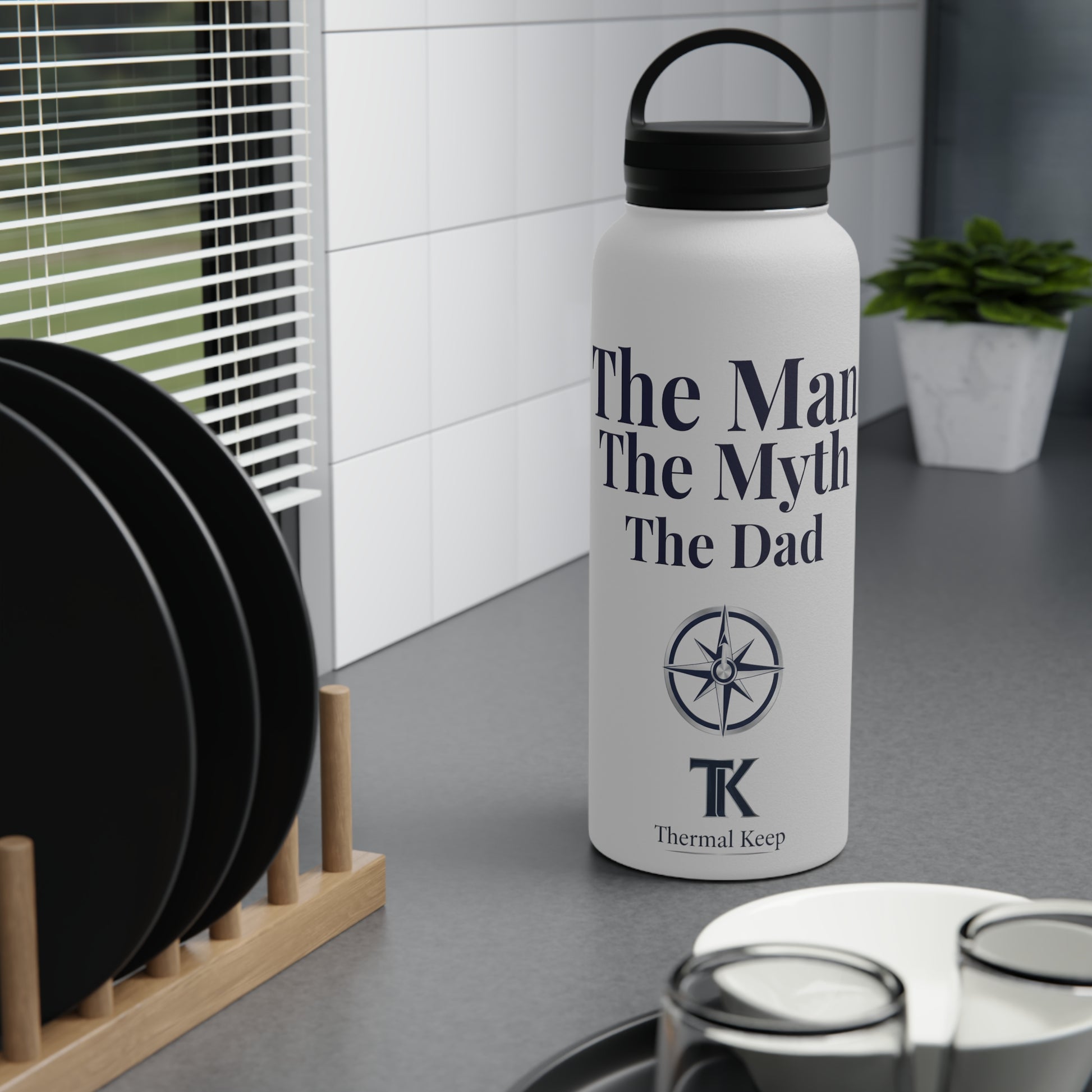 White water bottle with text and logo on a kitchen counter