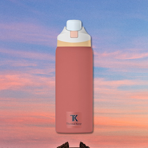 Red stone thermos bottle with white and gold accents on a colorful sky background
